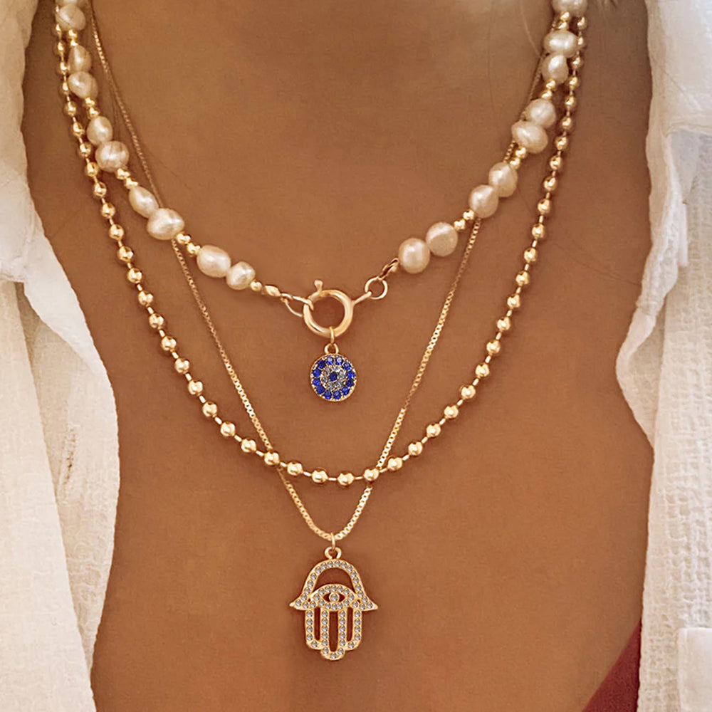 Multi-Layer Necklace: Pearl, Eye, and Hand Pendant