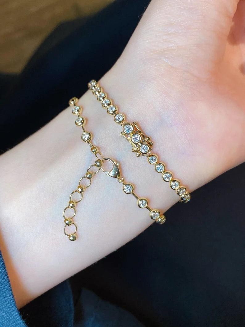 Adjustable stackable bracelet with round lab diamonds and 18K solid gold bezel setting, ideal for stacking or standalone wear.