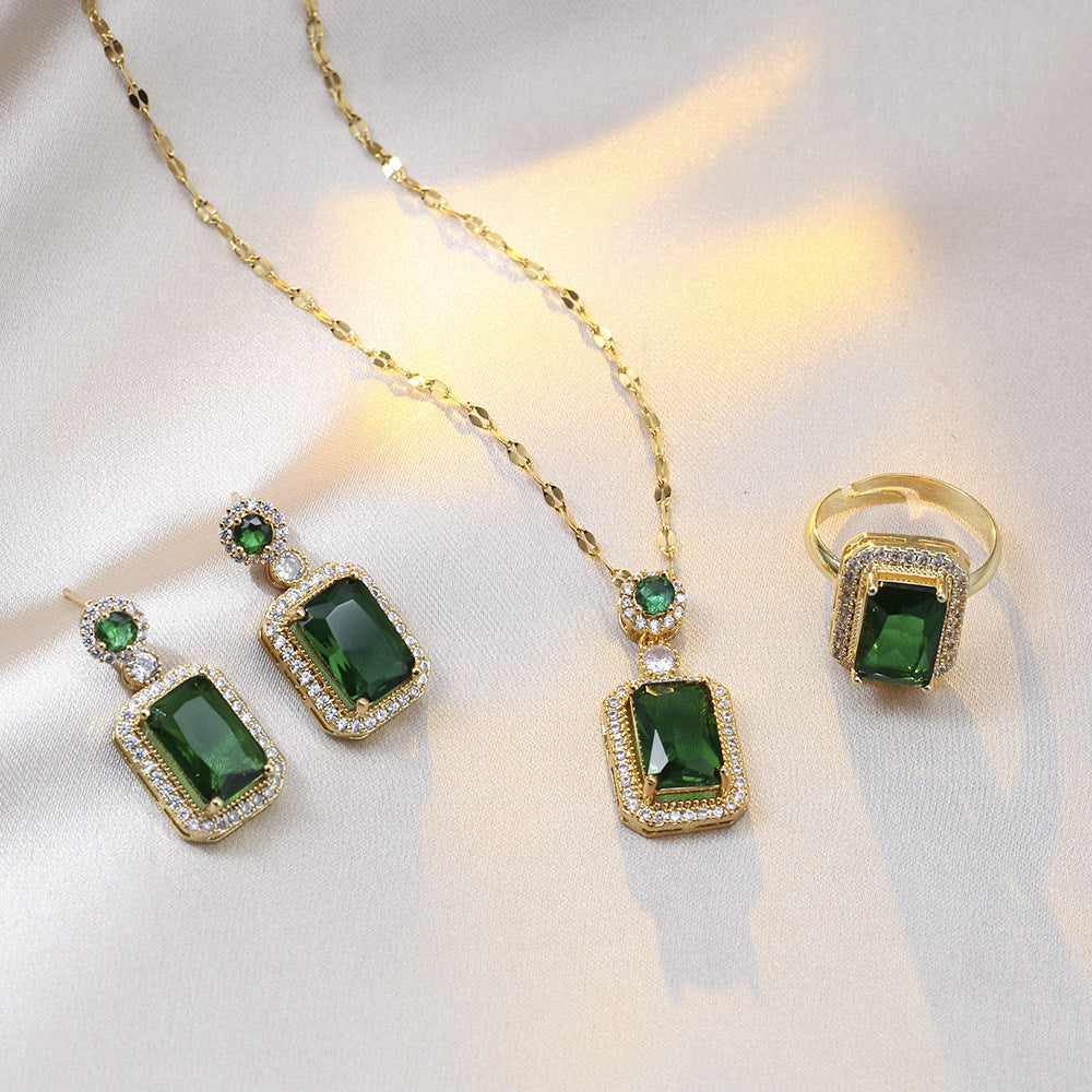 Green zircon jewelry set for women featuring titanium steel, includes a necklace with lip chain, earrings, and a ring. Elegant and non-fading.