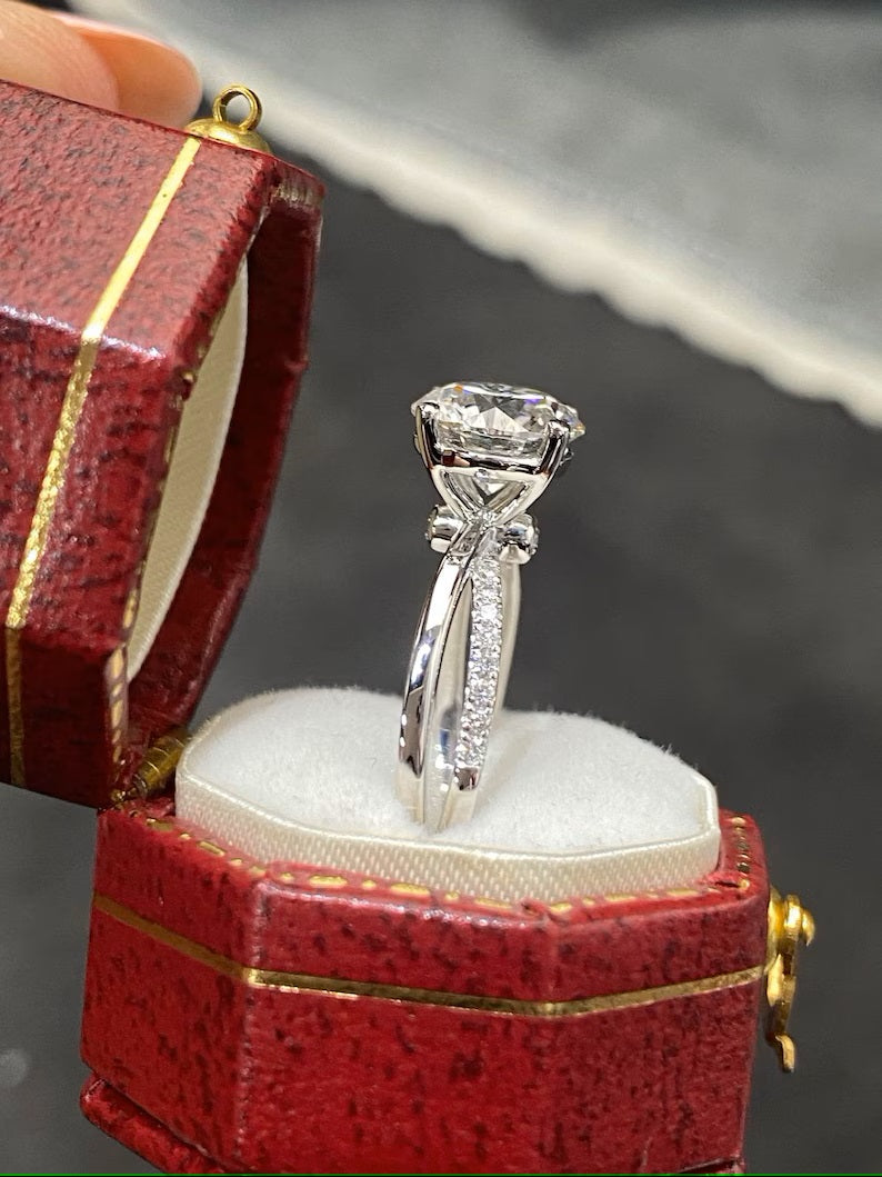 round lab-grown diamond engagement ring in split setting with four-prong design