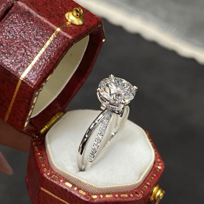 round lab-grown diamond engagement ring in split setting with four-prong design