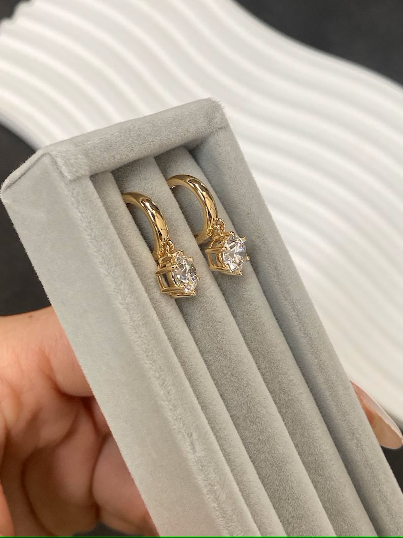 Solitaire lab diamond hoop earrings in 18K solid gold featuring a 2ct D/E color VS1/VS2 clarity diamond