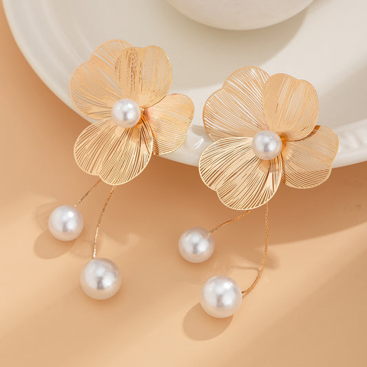 Floral tassel pearl earrings with a metal alloy base and electroplated finish, ideal for adding a fashionable touch.